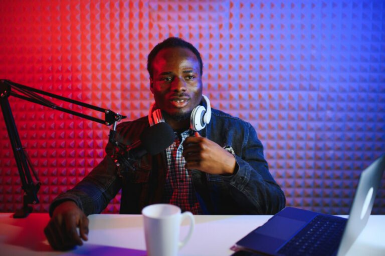 Black male influencer creates material for his internet audience, discussing new trends